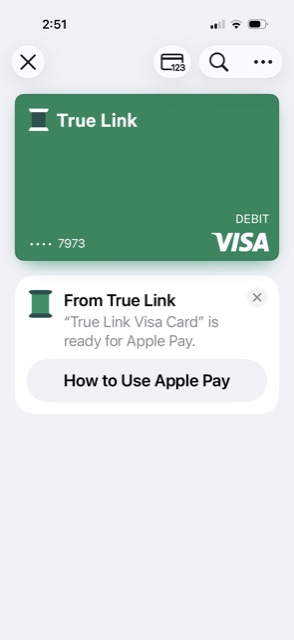 The finished card in Wallet, showing the green True Link Visa debit card and a From True Link message saying the card is ready for Apple Pay.